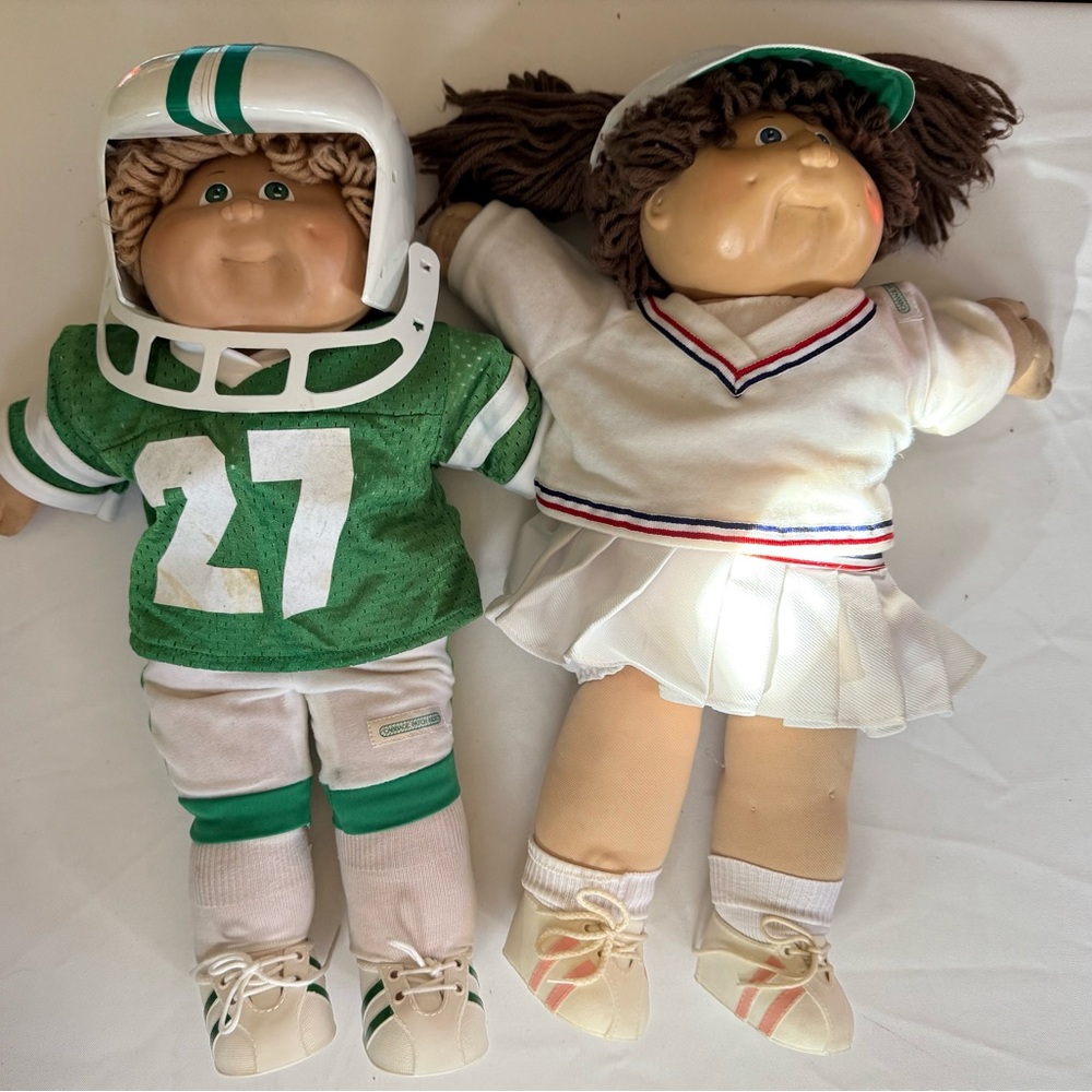 2 Vintage 1980s Cabbage Patch Dolls in sports Outfits